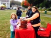 woman and girl churning ice cream